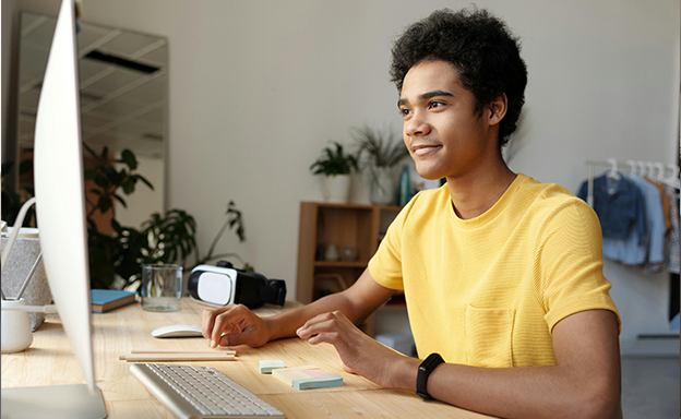 Student researching online opportunities with guidance from Australia immigration consultants in Kerala